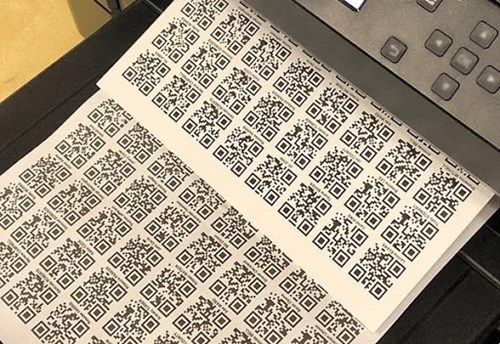 A printer printing out a barcode sticker
