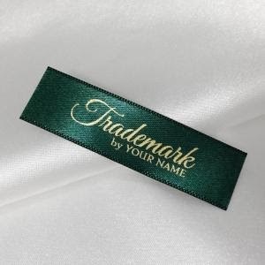 Custom woven label in emerald green